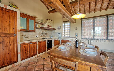 Unterkunft Glicini 3: Esszimmer, Küche, Wohnzimmer