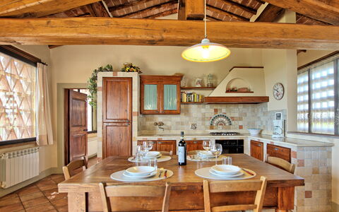 Unterkunft Glicini 3: Esszimmer, Küche, Wohnzimmer