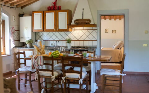 Unterkunft Montelopio 4: Esszimmer, Küche, Wohnzimmer