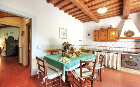 Unterkunft Montelopio 3: Esszimmer, Küche, Wohnzimmer