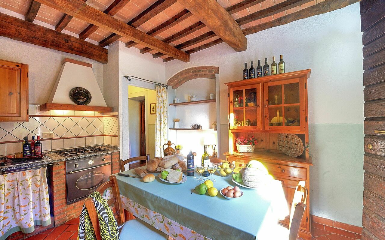 Unterkunft Montelopio 2: Esszimmer, Küche, Wohnzimmer