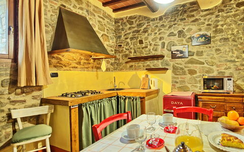 Unterkunft Orietta 1: Esszimmer, Küche, Wohnzimmer