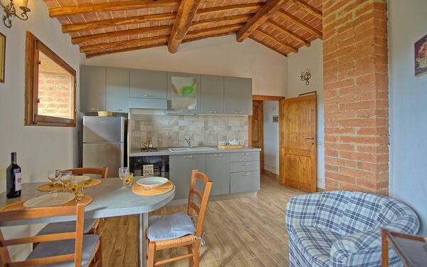 Unterkunft San Donnino 2: Esszimmer, Küche, Wohnzimmer