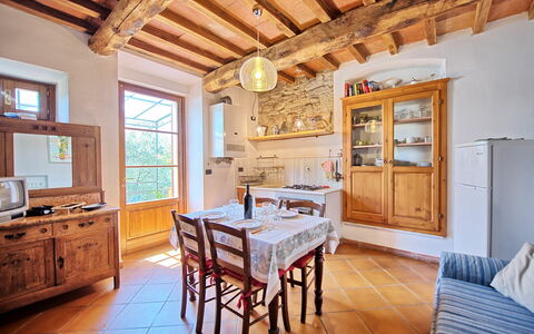 Unterkunft Rustico: Esszimmer, Küche, Wohnzimmer