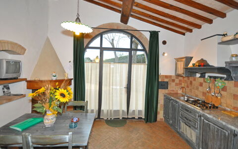 Unterkunft Olivo: Esszimmer, Küche, Wohnzimmer