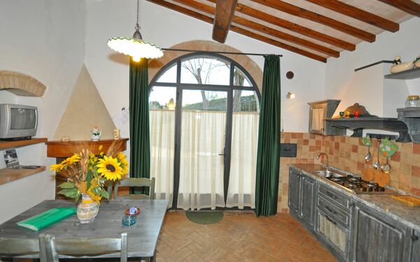 Unterkunft Olivo: Esszimmer, Küche, Wohnzimmer