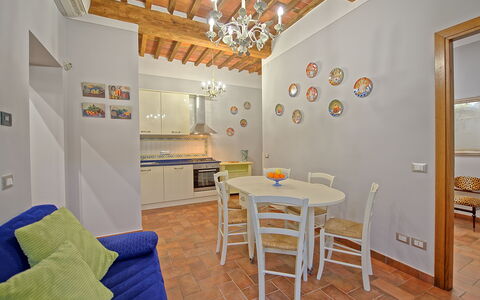 Unterkunft Flavia 4: Esszimmer, Küche, Wohnzimmer