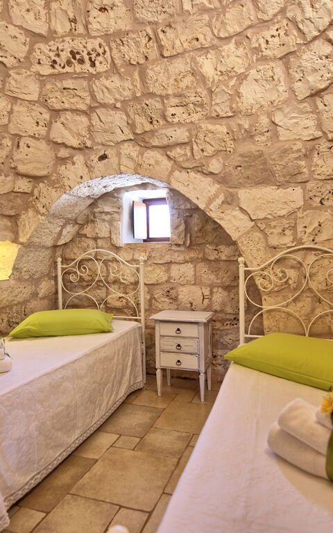 Trullo Santo Stefano: Schlafzimmer