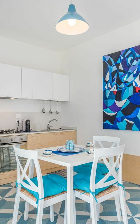 Villa Infinity: Esszimmer, Küche, Wohnzimmer