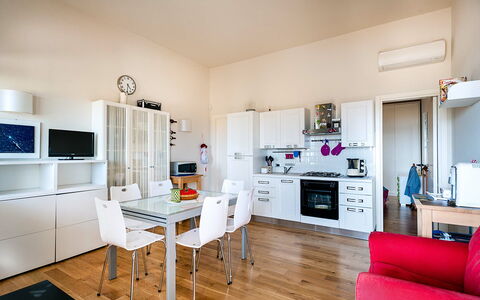 Unterkunft Vela: Esszimmer, Küche, Wohnzimmer