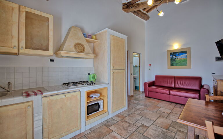 Unterkunft Mulignone 14: Esszimmer, Küche, Wohnzimmer