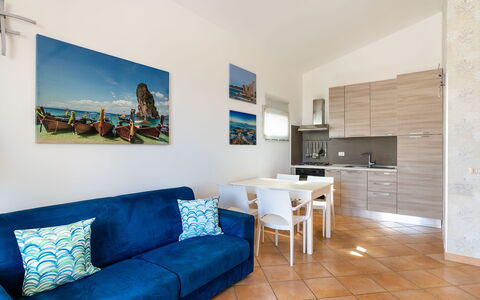 Unterkunft Calantha: Esszimmer, Küche, Wohnzimmer