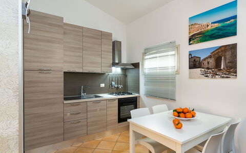 Unterkunft Fillide: Esszimmer, Küche, Wohnzimmer