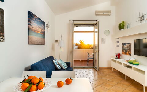 Unterkunft Fillide: Esszimmer, Küche, Wohnzimmer