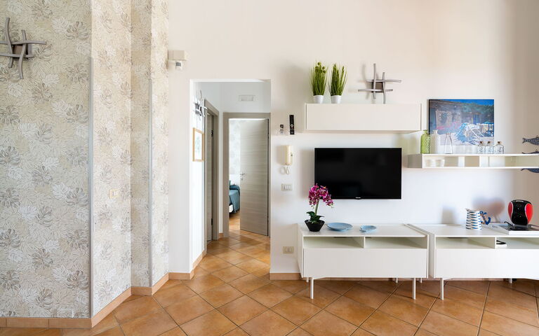 Unterkunft Calantha: Esszimmer, Küche, Wohnzimmer