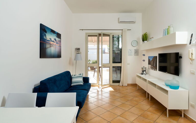 Unterkunft Kalika: Esszimmer, Küche, Wohnzimmer