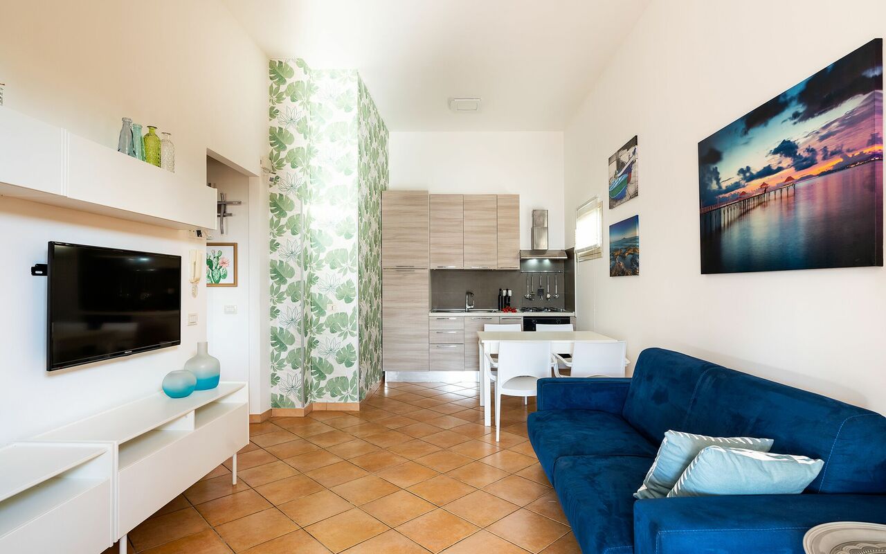 Unterkunft Kalika: Esszimmer, Küche, Wohnzimmer