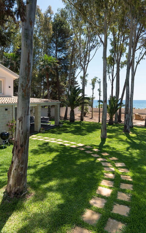 Marinella Punta Milocca: Draussen, Garten