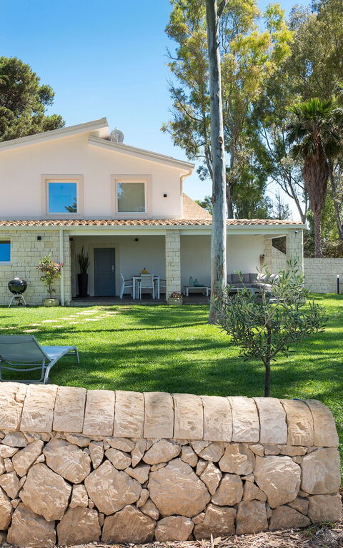 Marinella Punta Milocca: Draussen, Garten