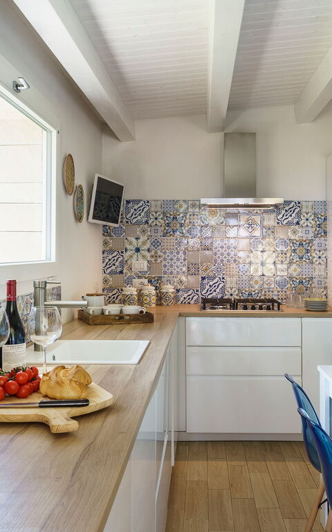 Marinella Punta Milocca: Esszimmer, Küche