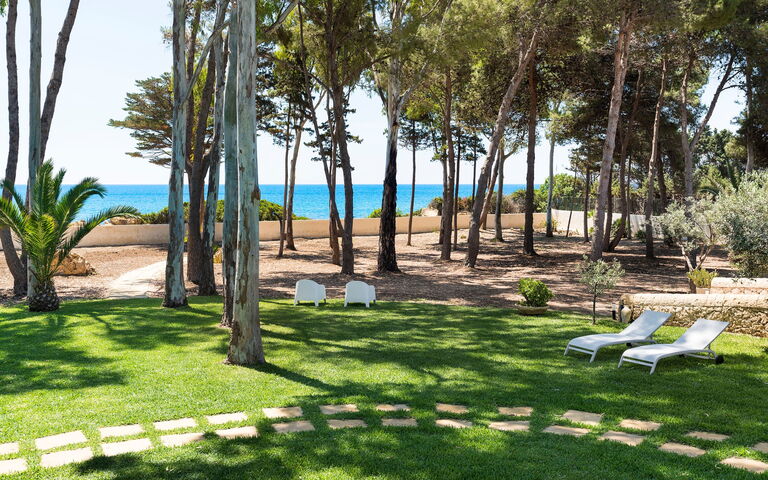 Marinella Punta Milocca: Draussen, Garten