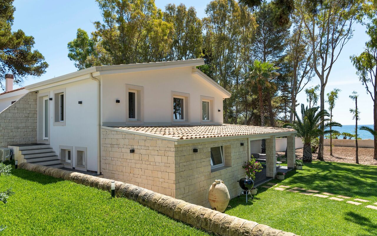 Marinella Punta Milocca: Draussen, Garten