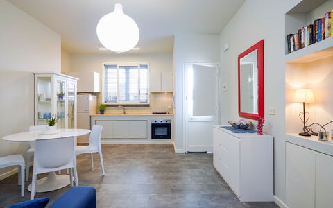 Unterkunft Corallo: Esszimmer, Küche, Wohnzimmer