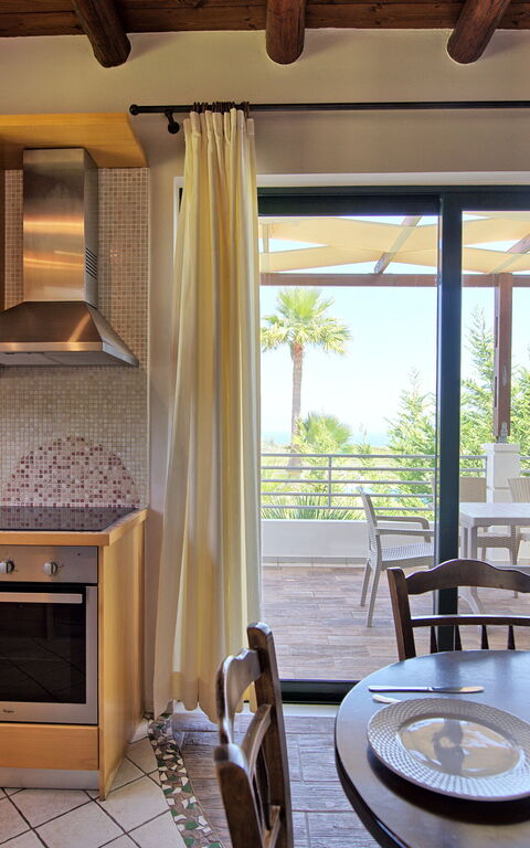 Villa Myrtia: Esszimmer, Küche, Wohnzimmer
