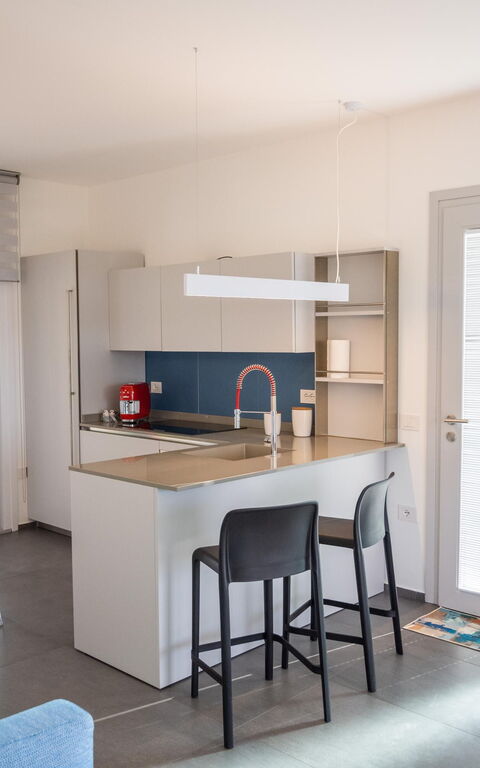 Villa Fior D'acqua: Esszimmer, Küche, Wohnzimmer